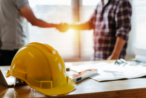 Construction Risk Management Why Subcontractor Oversight Matters - Construction Workers Safety Meeting.